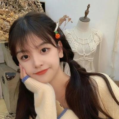彼女